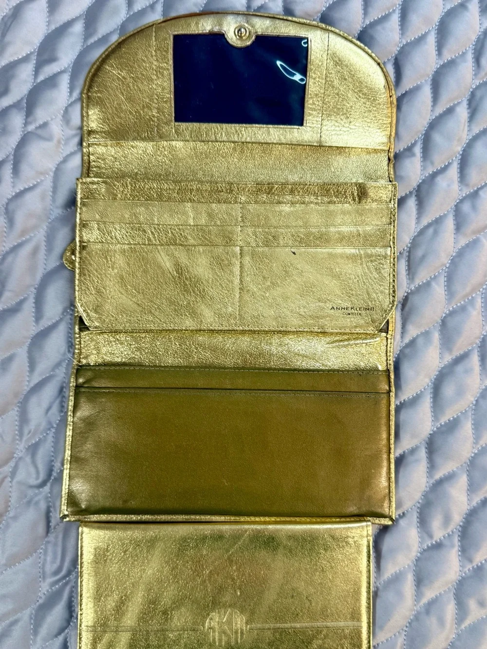 Metallic Gold Phone Wallet Case with Embossed Monogram Detail